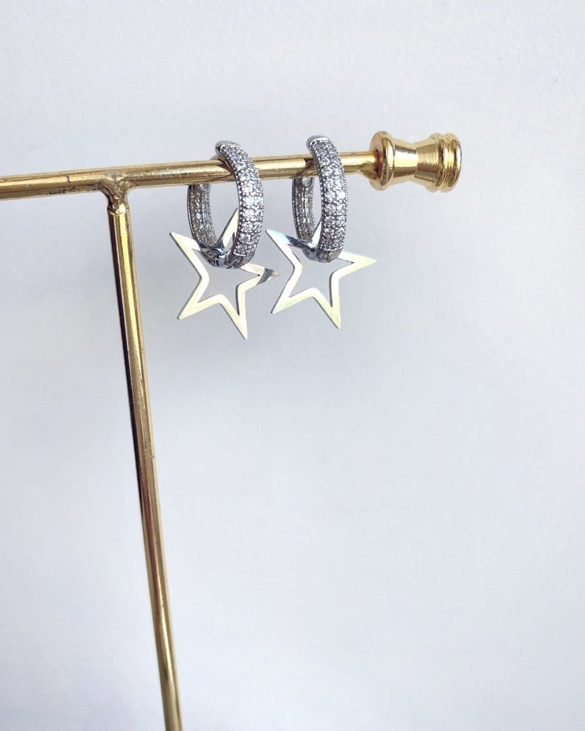 Sparkling silver earrings with a star