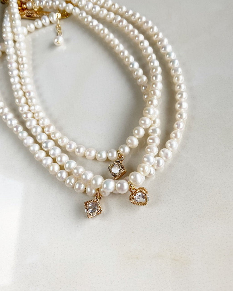 Pearls with minimalist cubic zirconia crystal