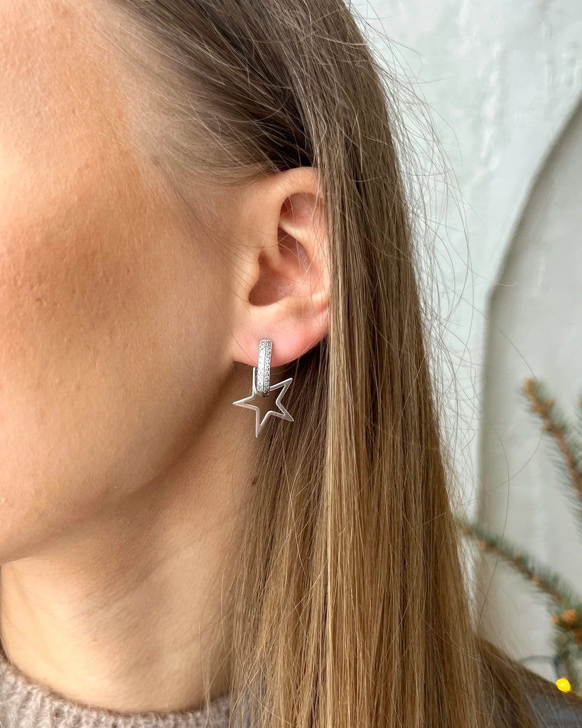 Silver earrings with a star pendant