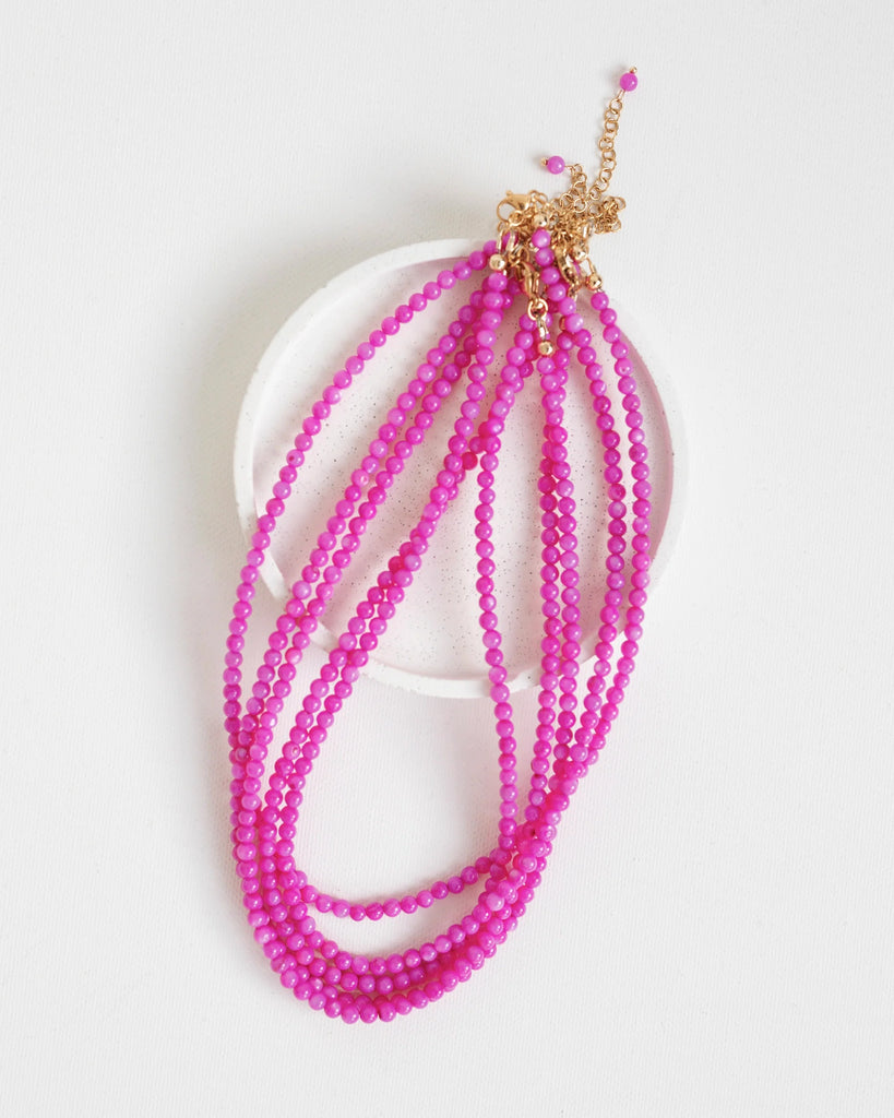 Bright pink necklace for vacation