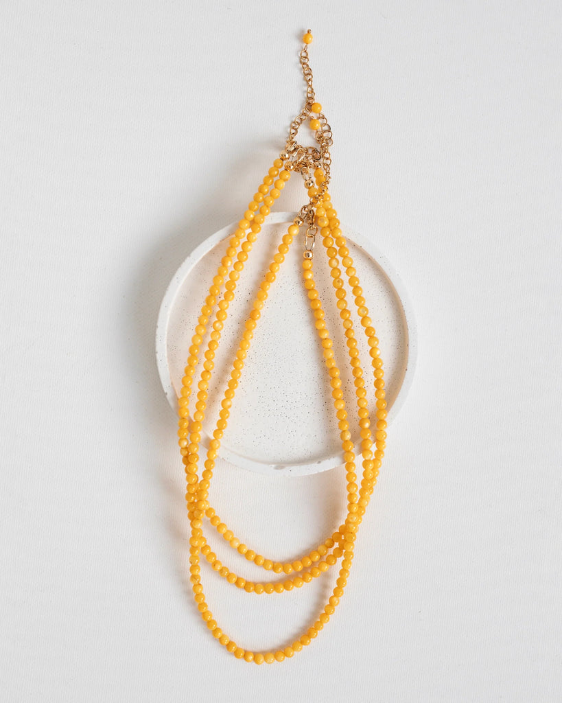 Bright yellow necklace for summer