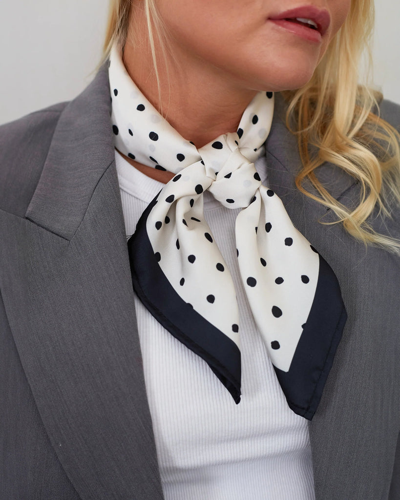 White scarf with black dots