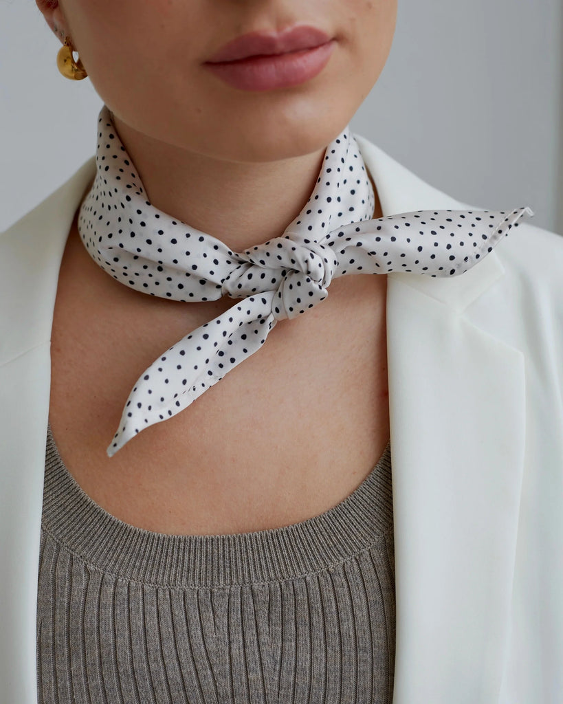 Small white scarf with black dots