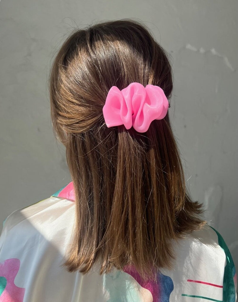 Bright pink scrunchie hair clip