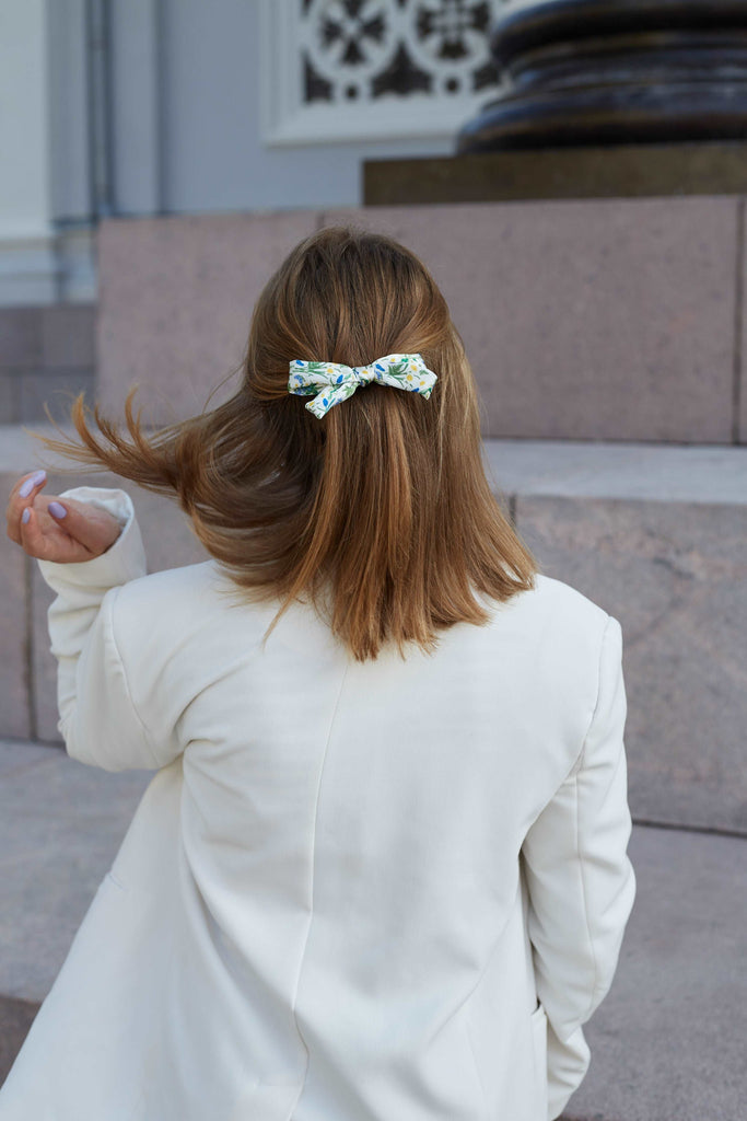 White mini bow hair clip with flowers