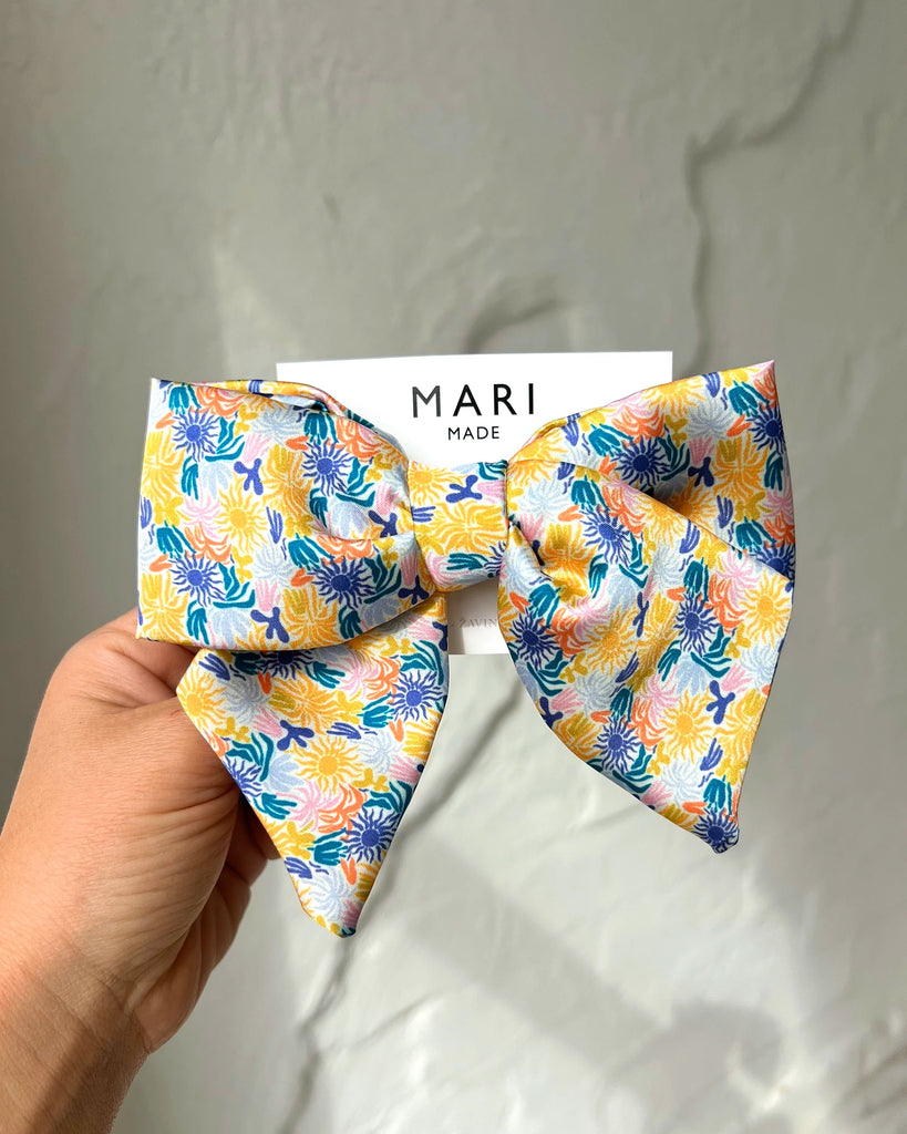 SUN KISSED BOW BARRETTE