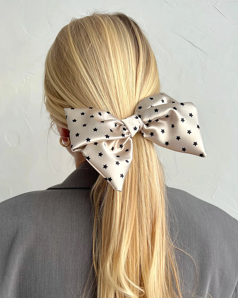 Nude bow barrette with stars