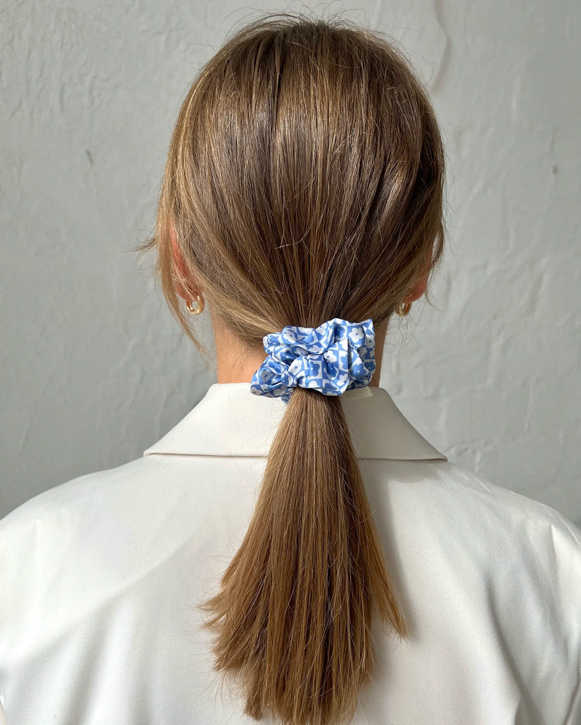 Blue scrunchie with white flowers