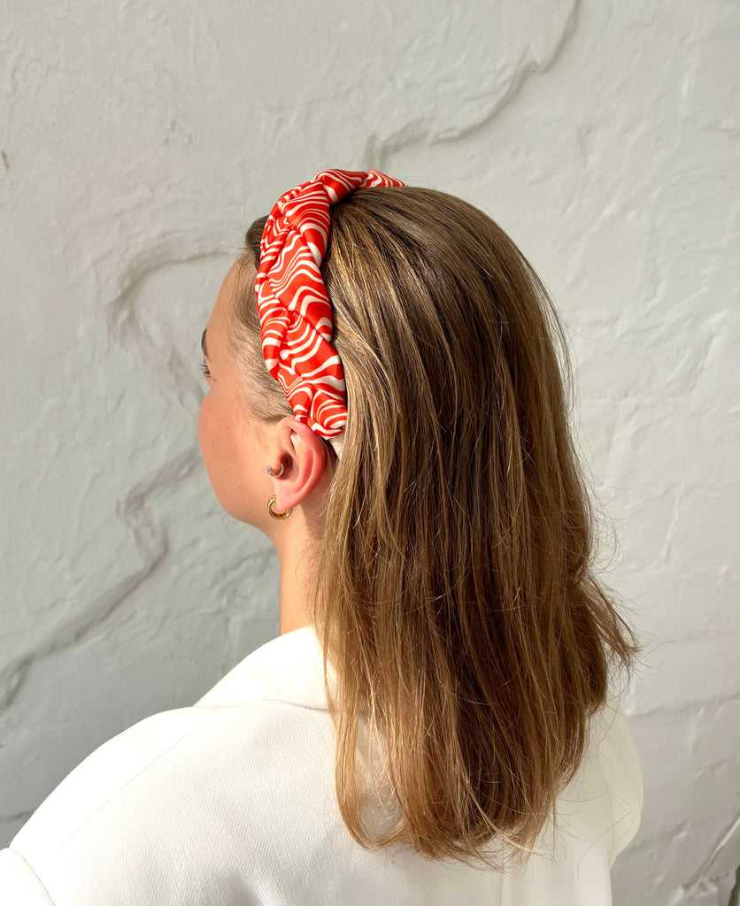 Orange and white woven headband