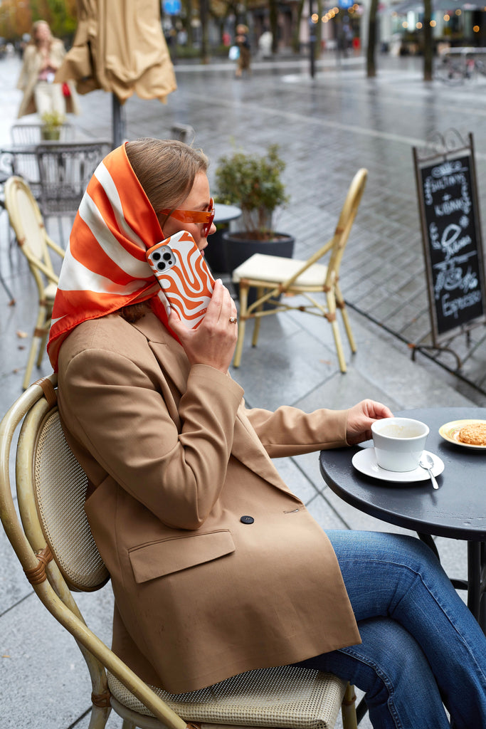 Orange dance scarf and phone case