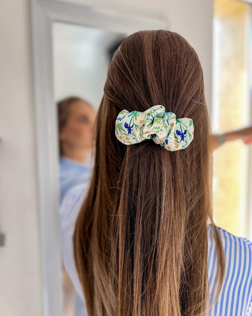 White scrunchie hair clip with flowers