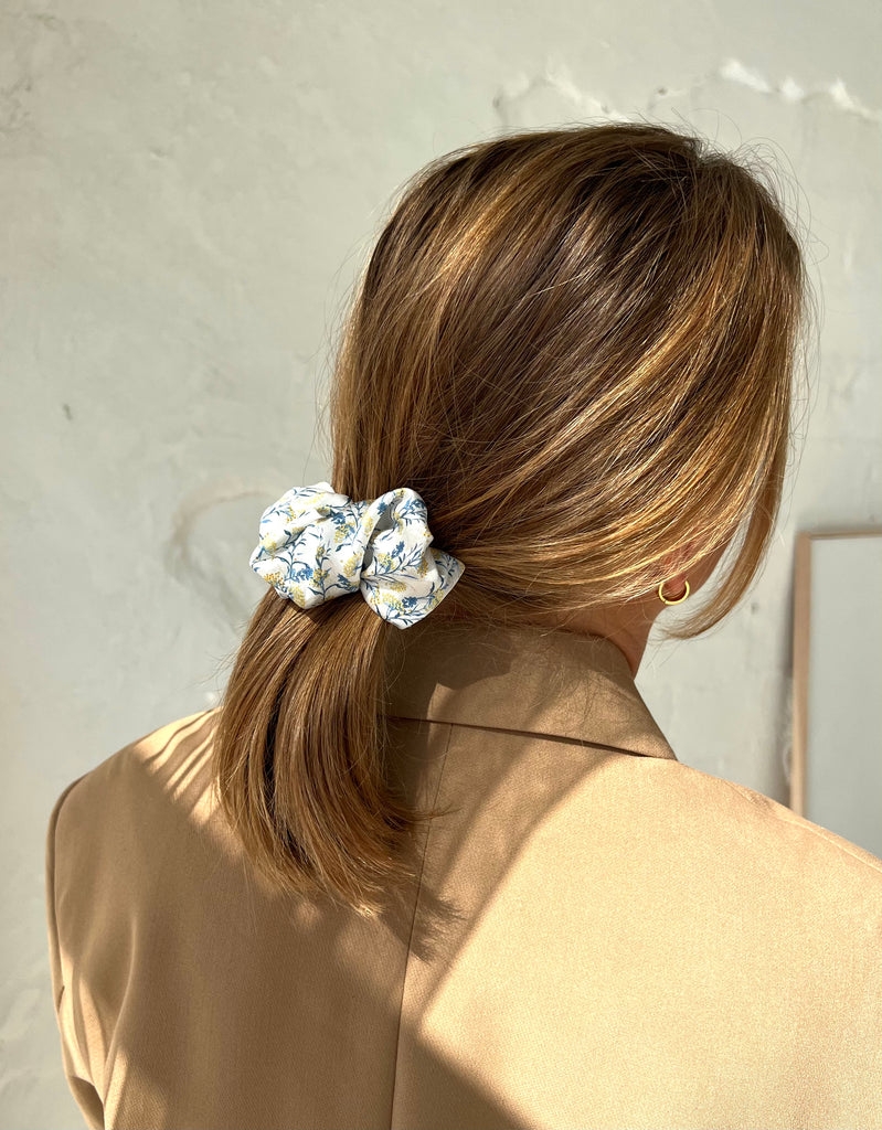 White hair clip with flowers