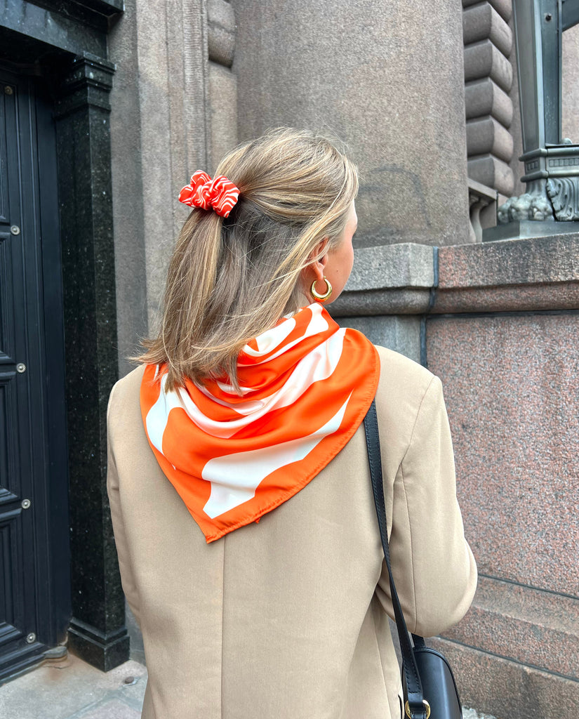 Orange hair clip and scarf