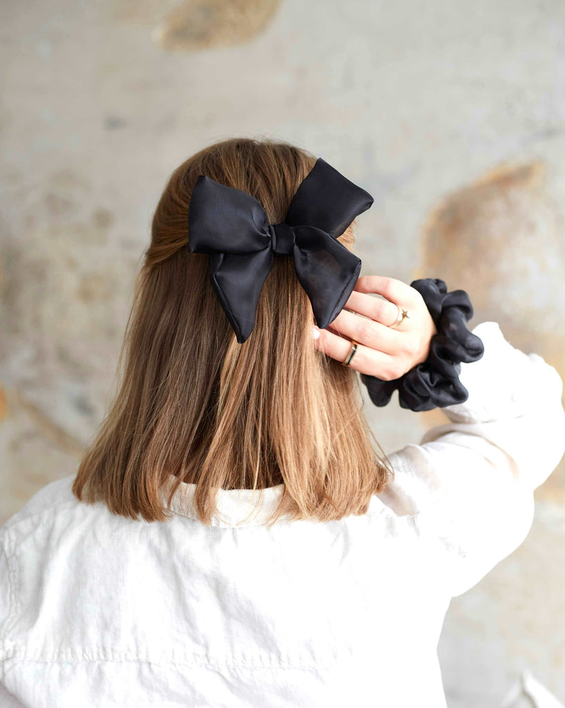 Massive black bow barrette