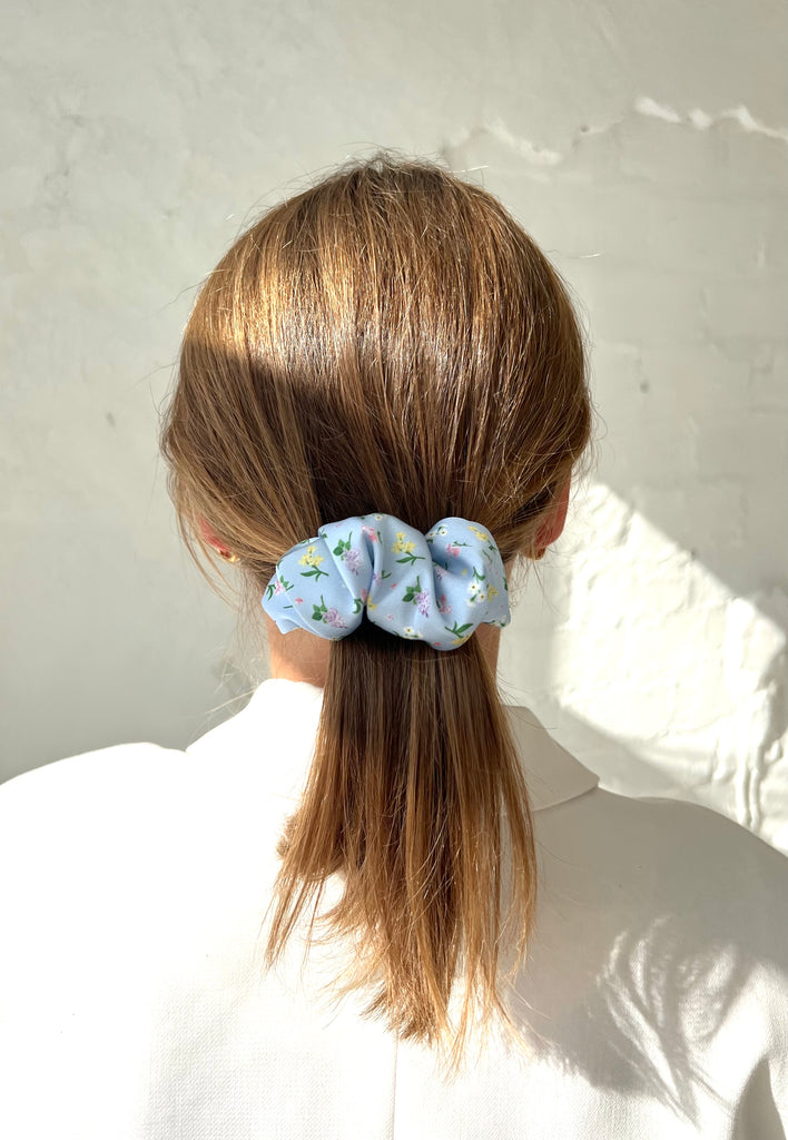 Light blue hair clip with flowers