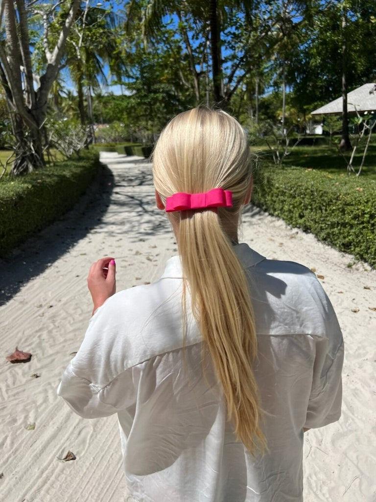 Bright pink ribbon hair clip