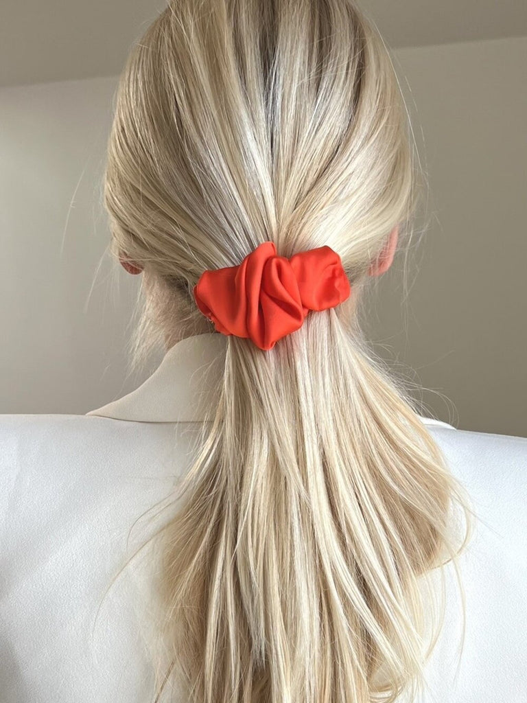 Bright orange hair clip for all hair types