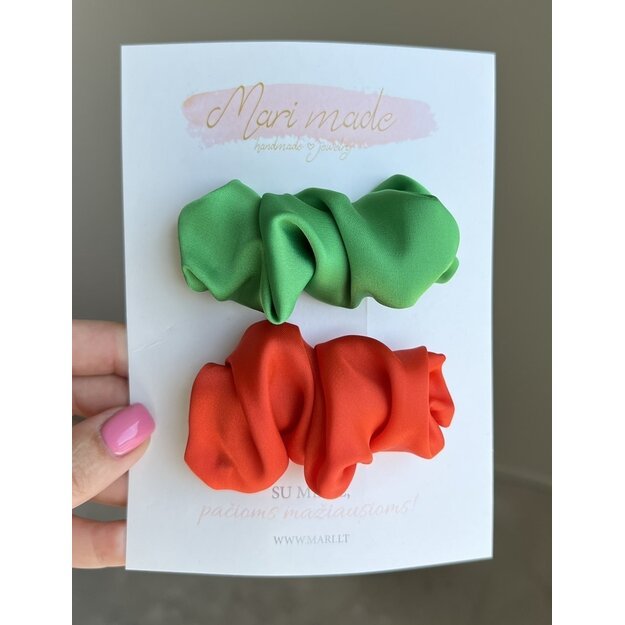 Green and orange hair clips