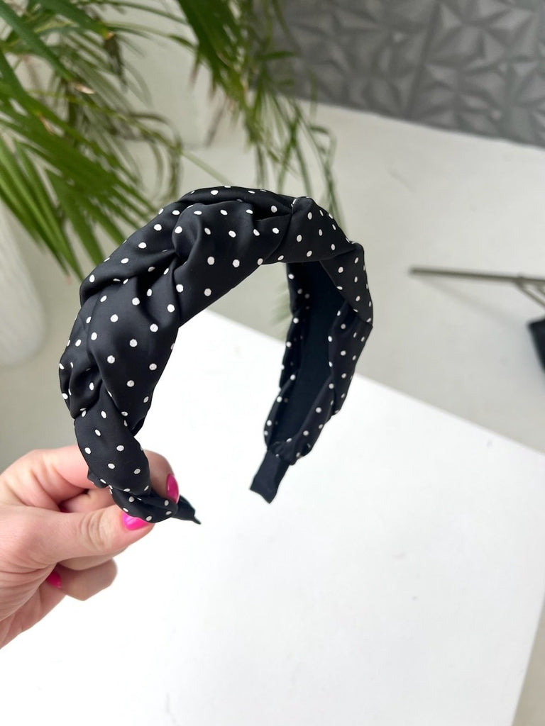 Black headband with white dots