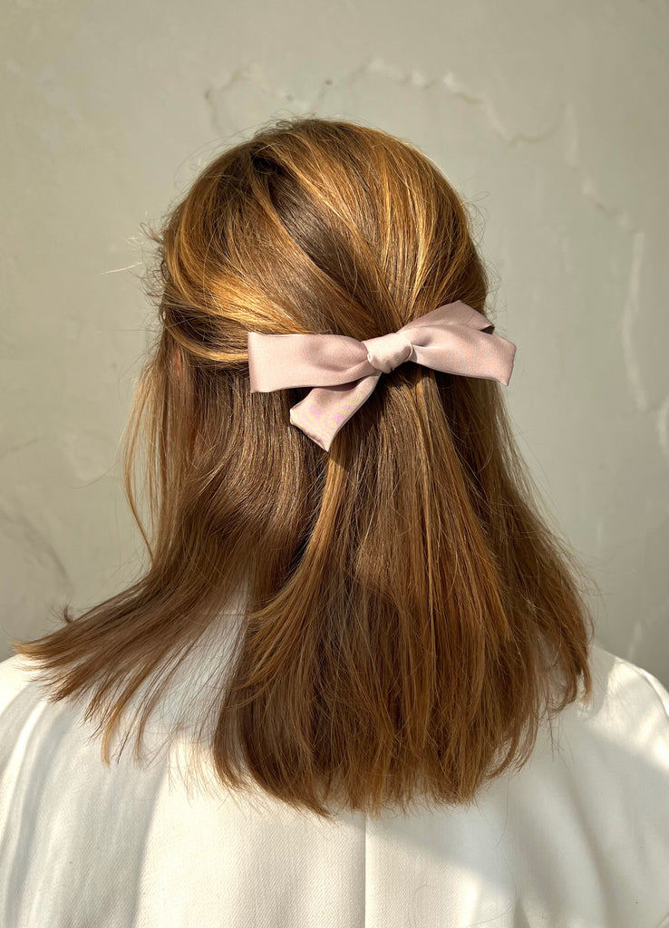 Light pink mini bow hair clip