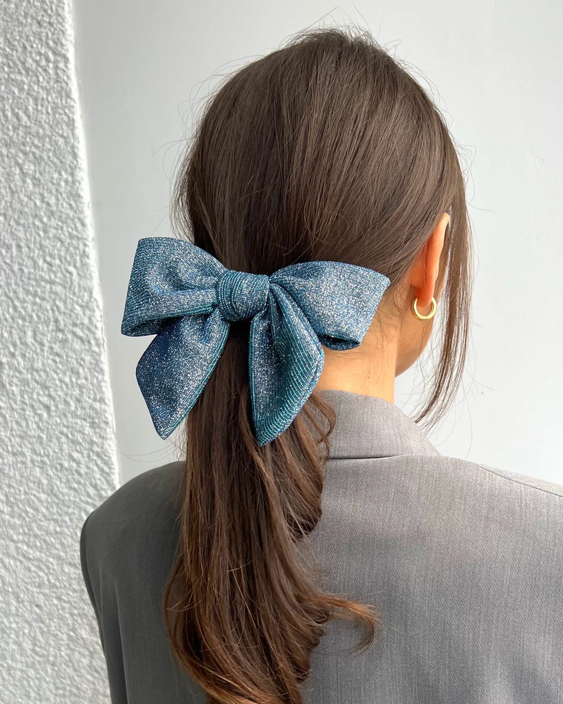 Sparkling blue bow hair clip for occasions